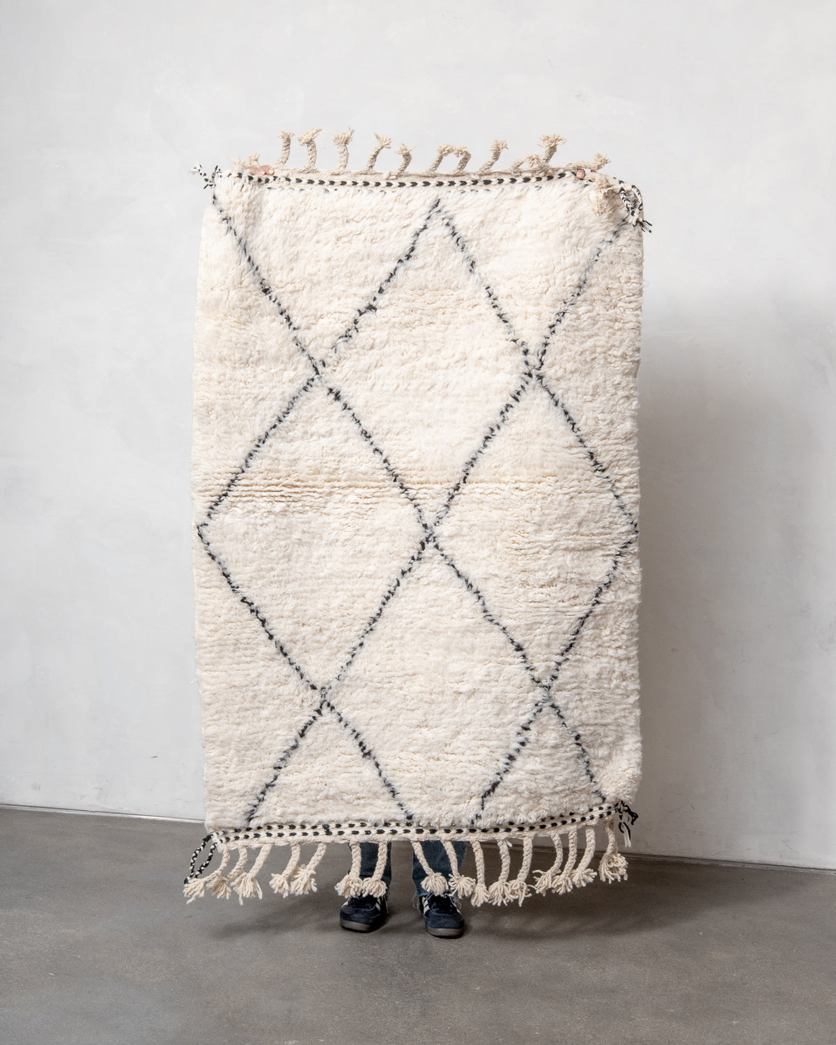 Modern, designer, handcrafted Berber rug from Morocco. Beniourain carpet with minimalist design, natural wool pile and a fluffy texture.