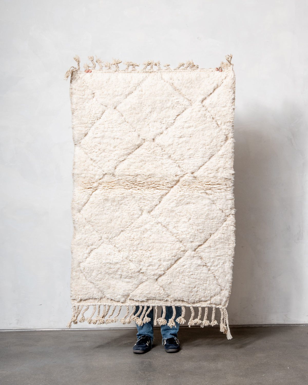 Modern, designer, handcrafted Berber rug from Morocco. Beniourain carpet with minimalist design, natural wool pile and a fluffy texture.