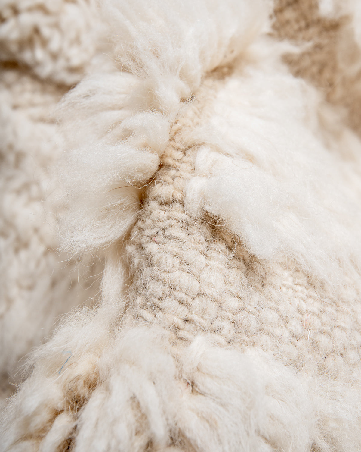 Modern, designer, handcrafted Berber rug from Morocco. Beniourain carpet with minimalist design, natural wool pile and a fluffy texture.