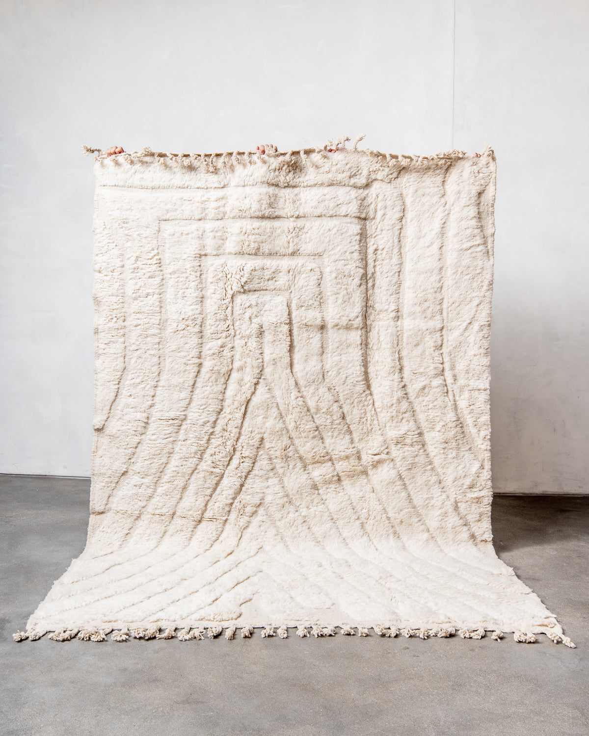 Modern, designer, handcrafted Berber rug from Morocco. Beniourain carpet with minimalist design, natural wool pile and a fluffy texture.