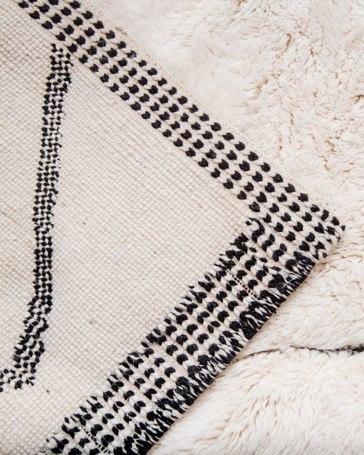 Modern, designer, handcrafted 100% sheep’s wool Berber rug from Morocco. Beni M’rirt carpet with beautiful colours and patterns and fluffy wool texture. 