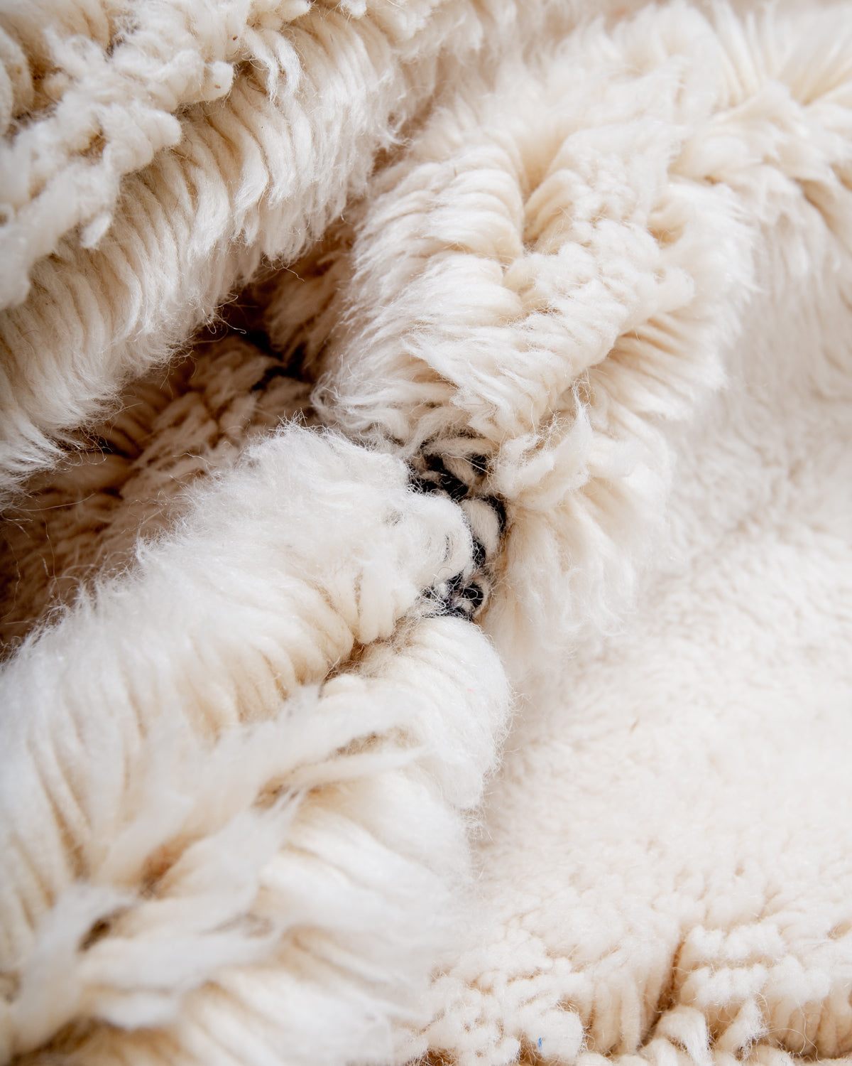 Modern, designer, handcrafted 100% sheep’s wool Berber rug from Morocco. Beni M’rirt carpet with beautiful colours and patterns and fluffy wool texture. 