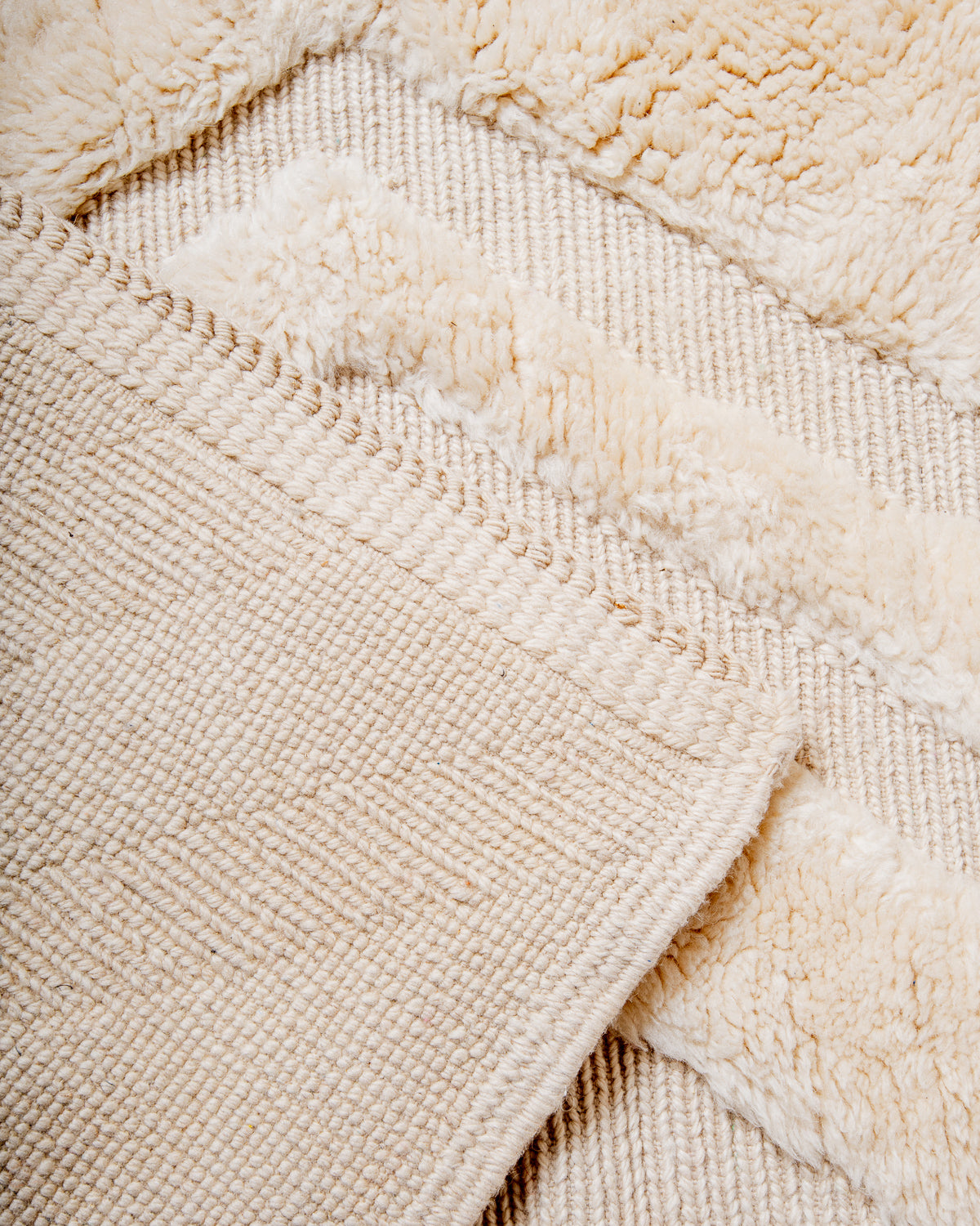 Modern, designer, handcrafted 100% sheep’s wool Berber rug from Morocco. Beni M’rirt carpet with beautiful colours and patterns and fluffy wool texture.