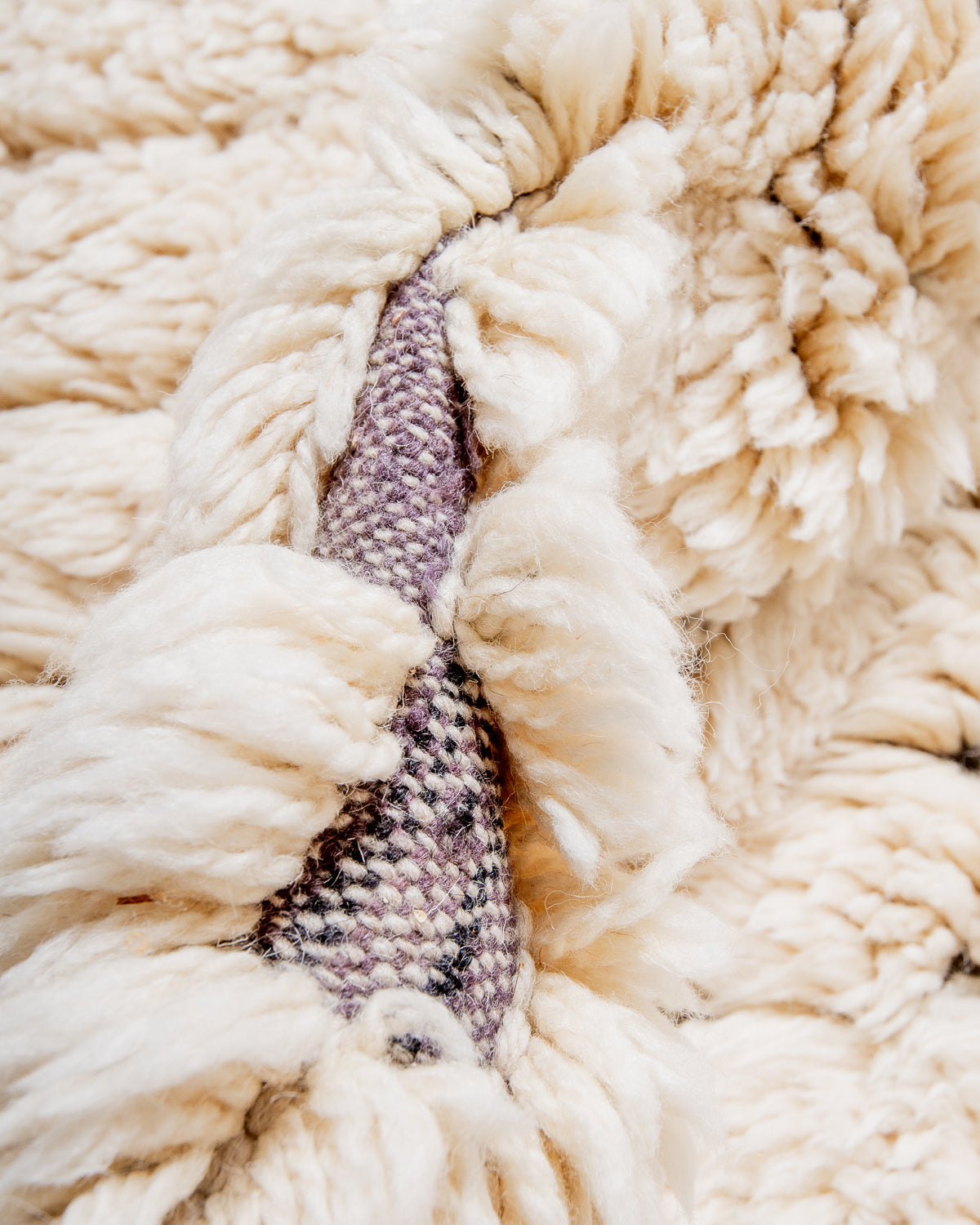 Modern, designer, handcrafted 100% sheep’s wool Berber rug from Morocco. Beni M’rirt carpet with beautiful colours and patterns and fluffy wool texture.