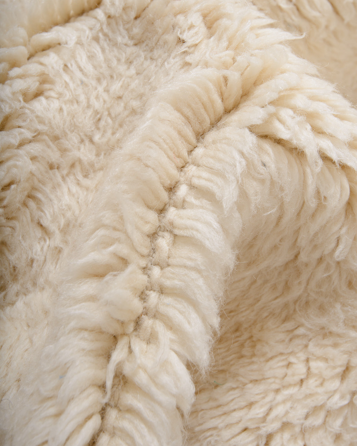 Modern, designer, handcrafted 100% sheep’s wool Berber rug from Morocco. Beni M’rirt carpet with beautiful colours and patterns and fluffy wool texture.