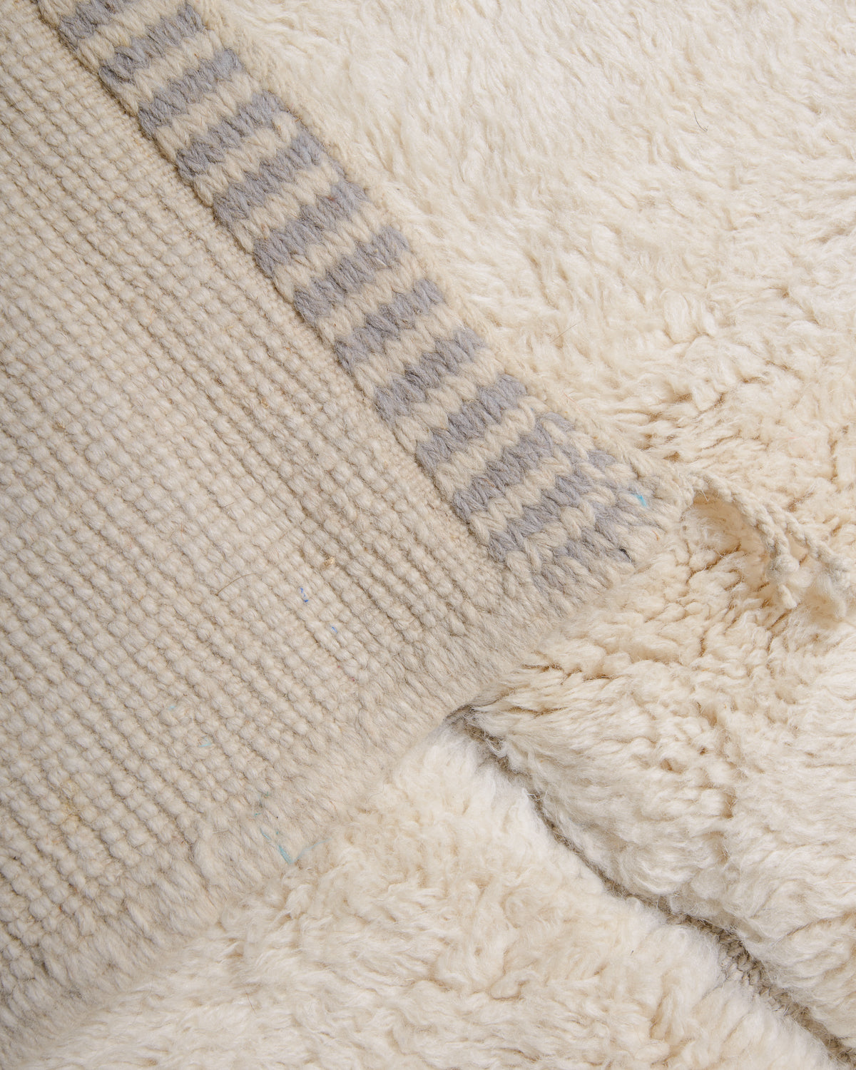 Modern, designer, handcrafted 100% sheep’s wool Berber rug from Morocco. Beni M’rirt carpet with beautiful colours and patterns and fluffy wool texture.