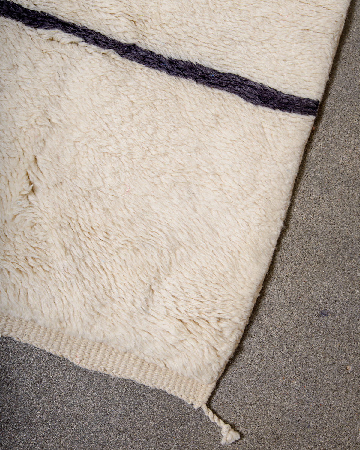 Modern, designer, handcrafted 100% sheep’s wool Berber rug from Morocco. Beni M’rirt carpet with beautiful colours and patterns and fluffy wool texture.