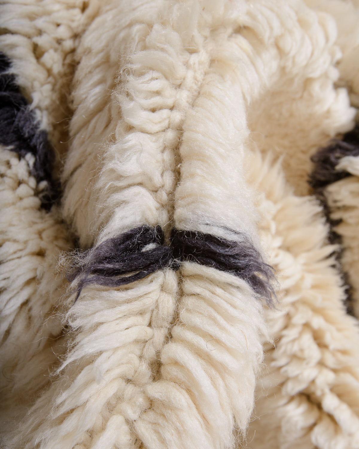 Modern, designer, handcrafted 100% sheep’s wool Berber rug from Morocco. Beni M’rirt carpet with beautiful colours and patterns and fluffy wool texture.