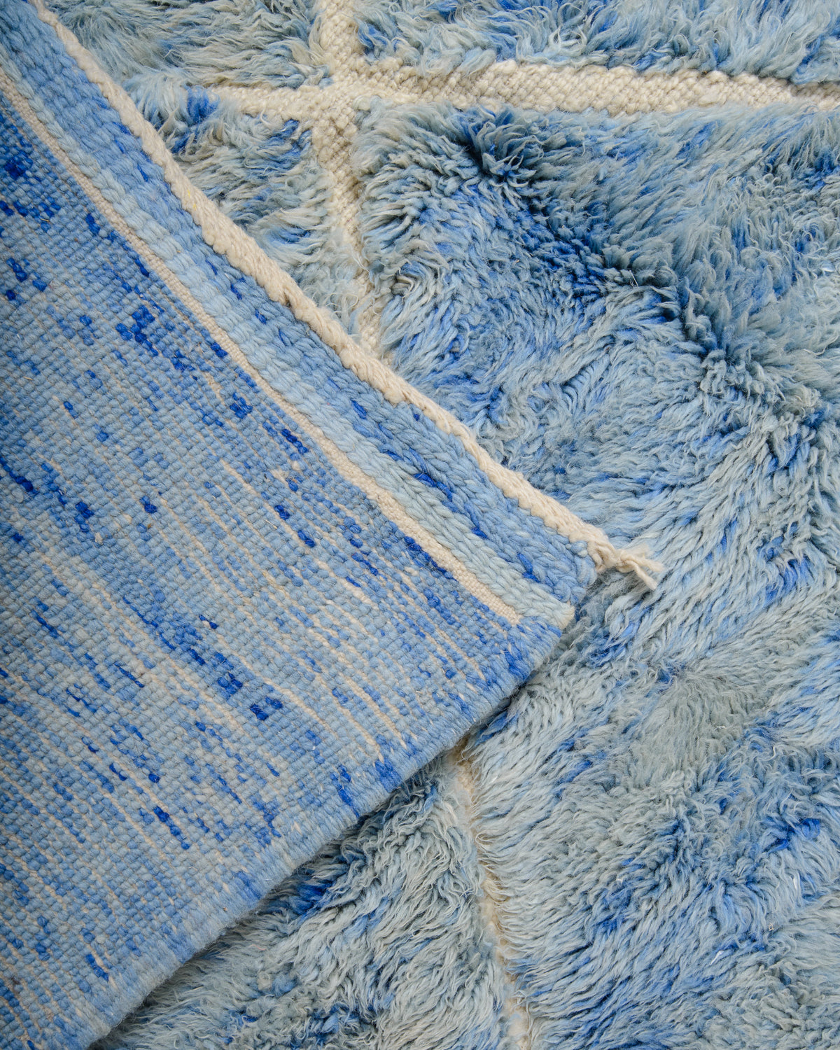 Modern, designer, handcrafted 100% sheep’s wool Berber rug from Morocco. Beni M’rirt carpet with beautiful colours and patterns and fluffy wool texture.