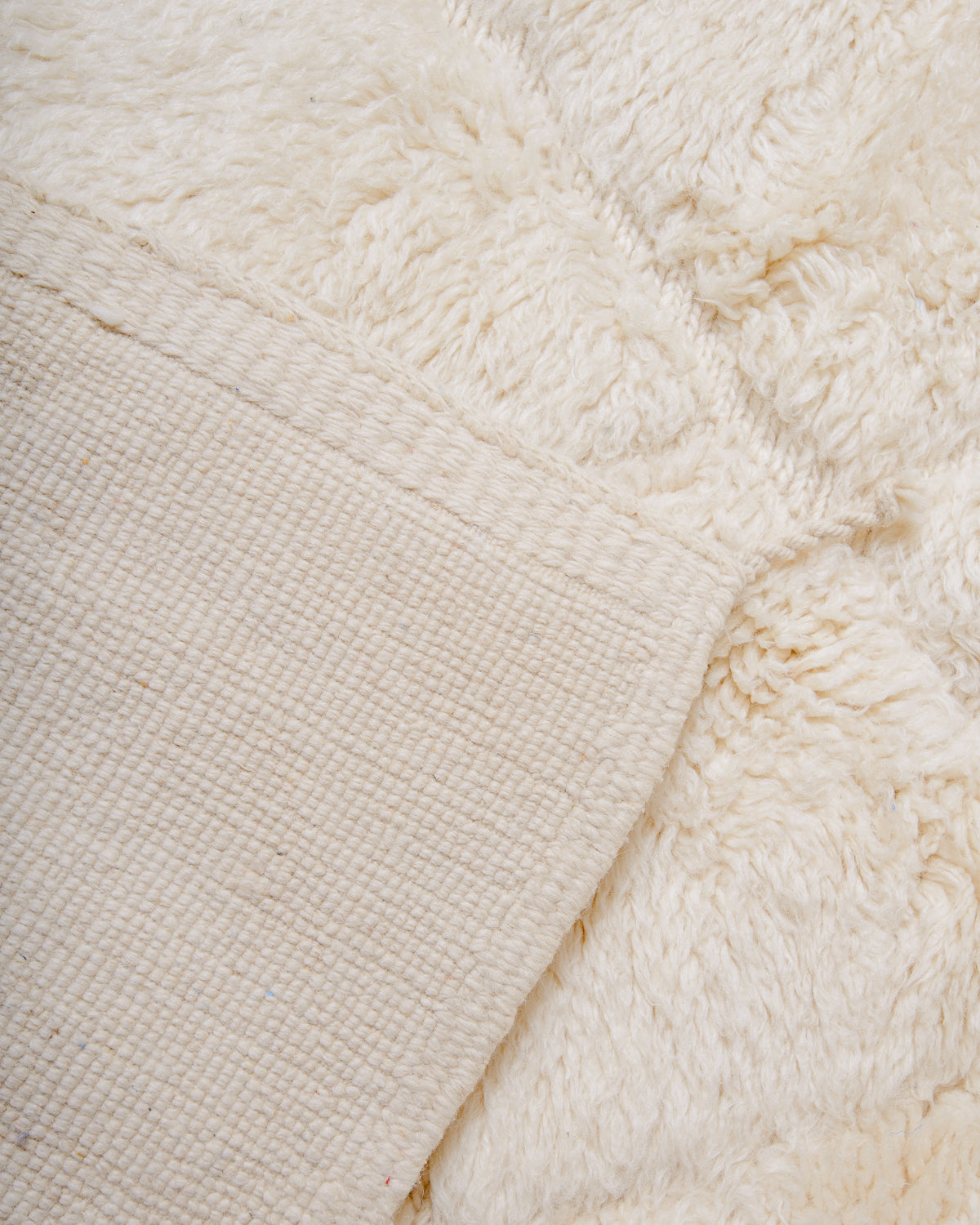 Modern, designer, handcrafted 100% sheep’s wool Berber rug from Morocco. Beni M’rirt carpet with beautiful colours and patterns and fluffy wool texture. 