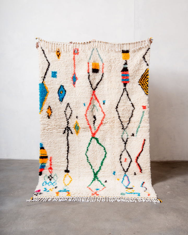 Modern designer handcrafted Berber rug from Morocco. Azilal rug with beautiful colors and patterns. Made of sheep’s wool and colourful cotton.