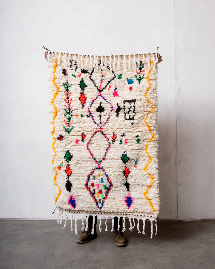 Modern designer handcrafted Berber rug from Morocco. Azilal rug with beautiful colors and patterns. Made of sheep’s wool and colourful cotton.