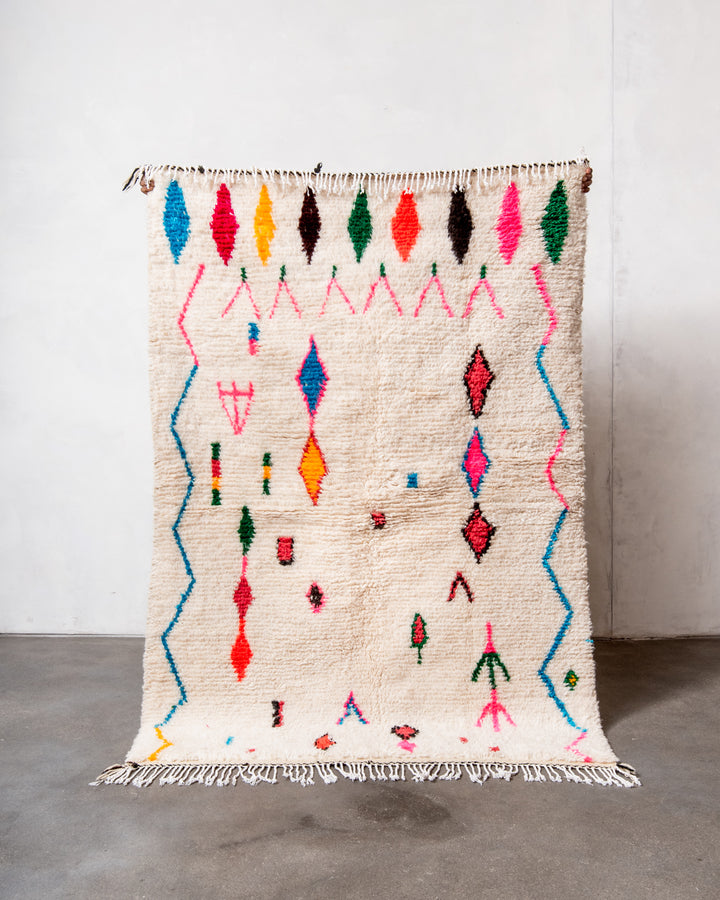 Modern designer handcrafted Berber rug from Morocco. Azilal rug with beautiful colors and patterns. Made of sheep’s wool and colourful cotton.