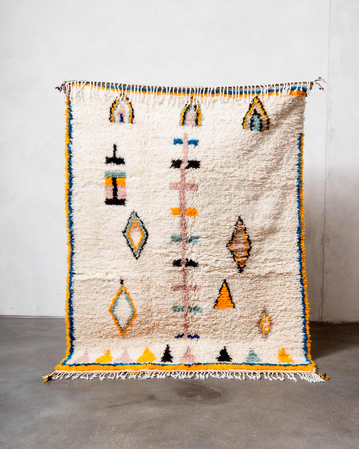 Modern designer handcrafted Berber rug from Morocco. Azilal rug with beautiful colors and patterns. Made of sheep’s wool and colourful cotton.