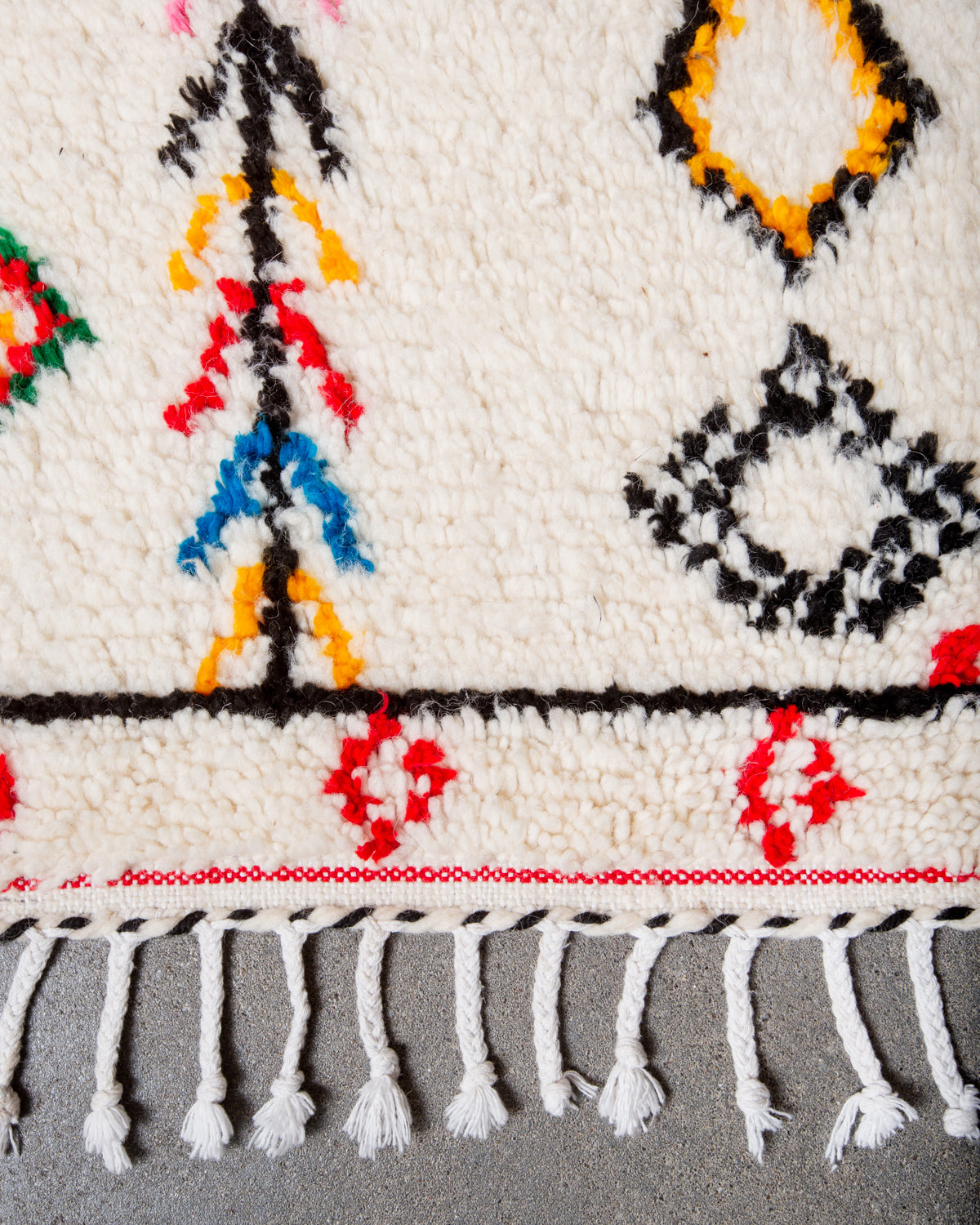 Modern designer handcrafted Berber rug from Morocco. Azilal rug with beautiful colours and patterns. Made of sheep’s wool and colourful cotton.