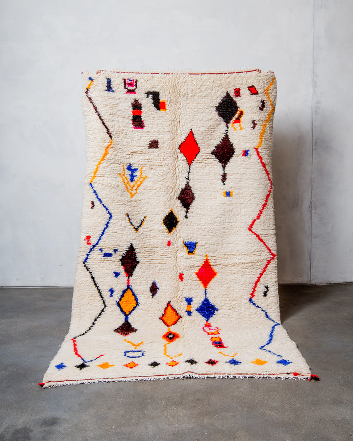 Modern designer handcrafted Berber rug from Morocco. Azilal rug with beautiful colours and patterns. Made of sheep’s wool and colourful cotton.