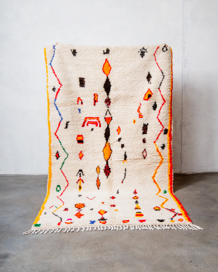 Modern designer handcrafted Berber rug from Morocco. Azilal rug with beautiful colours and patterns. Made of sheep’s wool and colourful cotton.