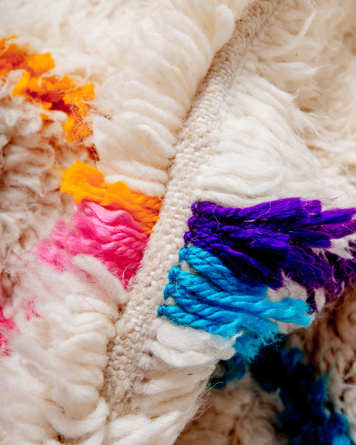 Modern designer handcrafted Berber rug from Morocco. Azilal rug with beautiful colours and patterns. Made of sheep’s wool and colourful cotton.