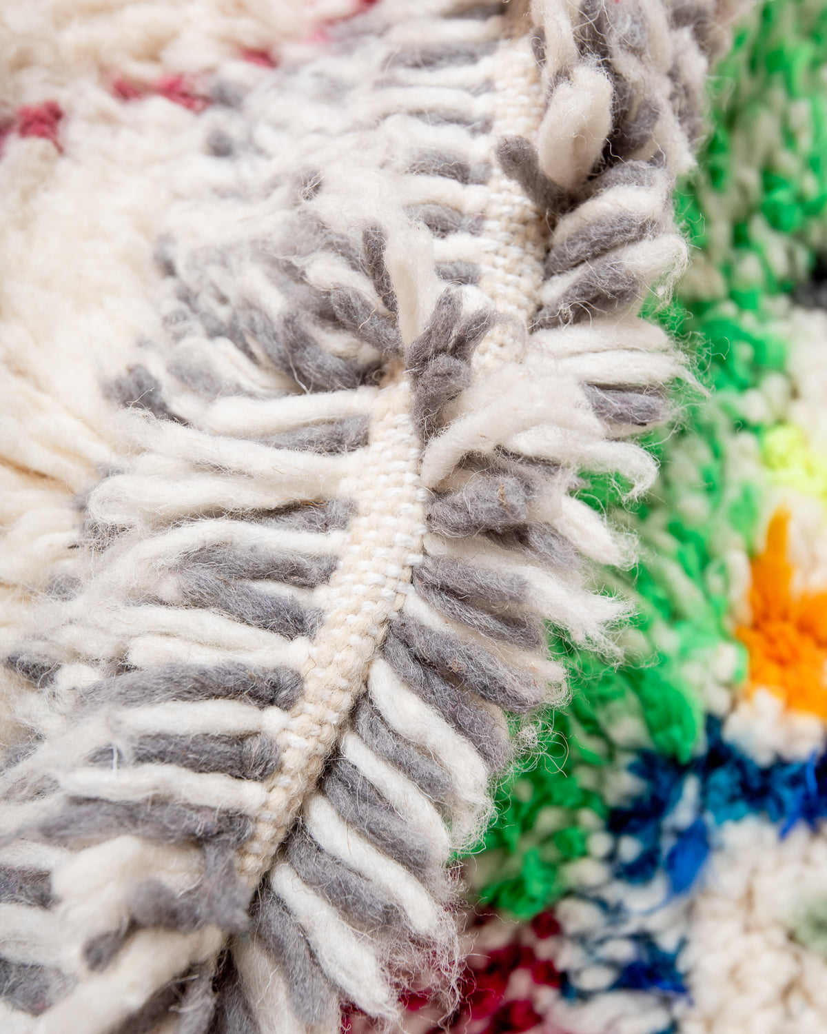 Modern designer handcrafted Berber rug from Morocco. Azilal rug with beautiful colors and patterns. Made of sheep’s wool and colourful cotton.