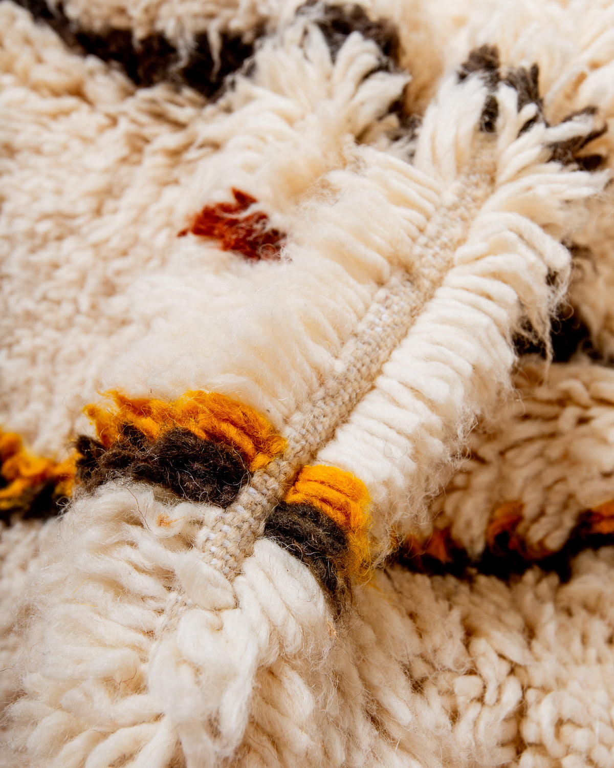 Modern designer handcrafted Berber rug from Morocco. Azilal rug with beautiful colours and patterns. Made of sheep’s wool and colourful cotton.