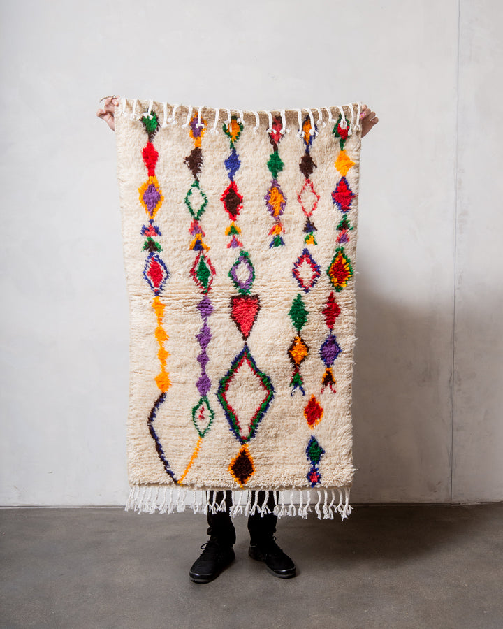 Modern designer handcrafted Berber rug from Morocco. Azilal rug with beautiful colours and patterns. Made of sheep’s wool and colourful cotton.