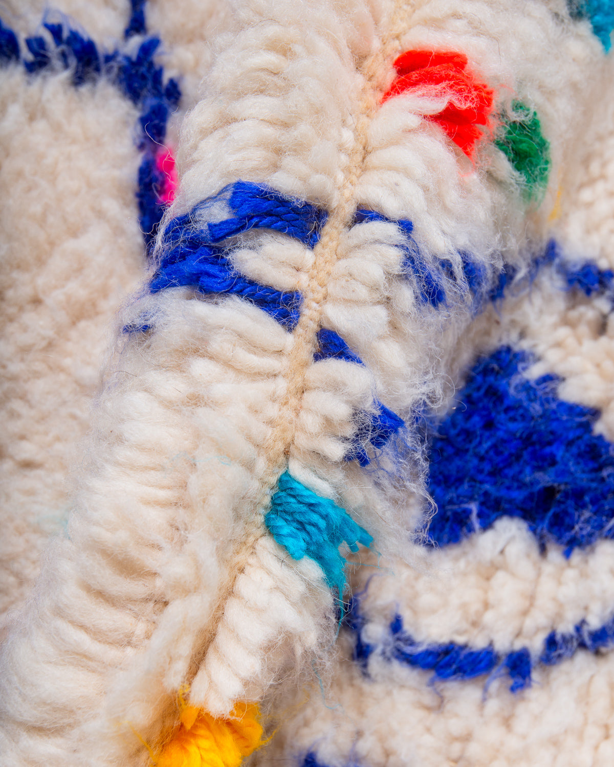 Modern designer handcrafted Berber rug from Morocco. Azilal rug with beautiful colours and patterns. Made of sheep’s wool and colourful cotton.