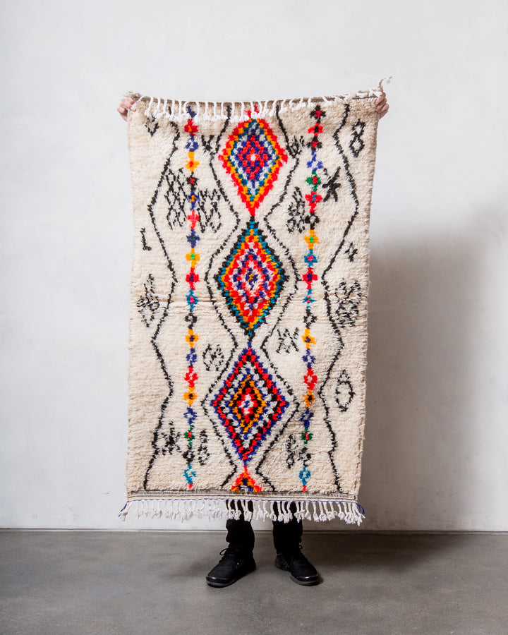 Modern designer handcrafted Berber rug from Morocco. Azilal rug with beautiful colours and patterns. Made of sheep’s wool and colourful cotton.