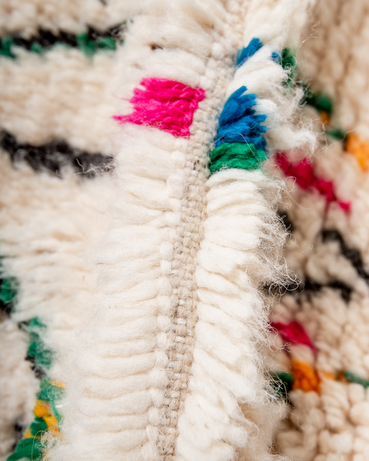 Modern designer handcrafted Berber rug from Morocco. Azilal rug with beautiful colors and patterns. Made of sheep’s wool and colourful cotton.