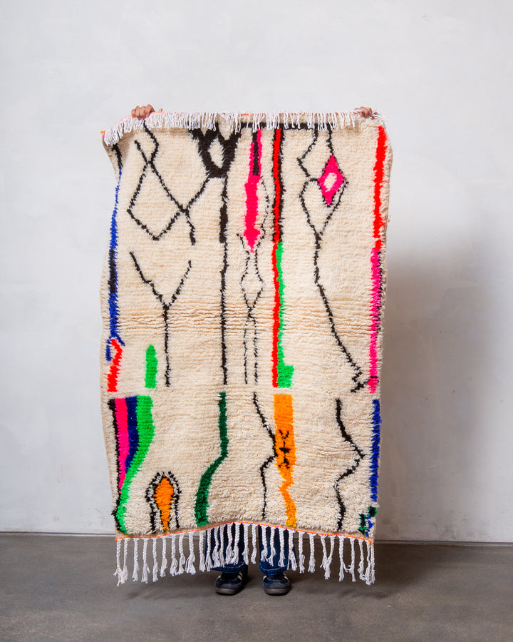 Modern designer handcrafted Berber rug from Morocco. Azilal rug with beautiful colours and patterns. Made of sheep’s wool and colourful cotton.