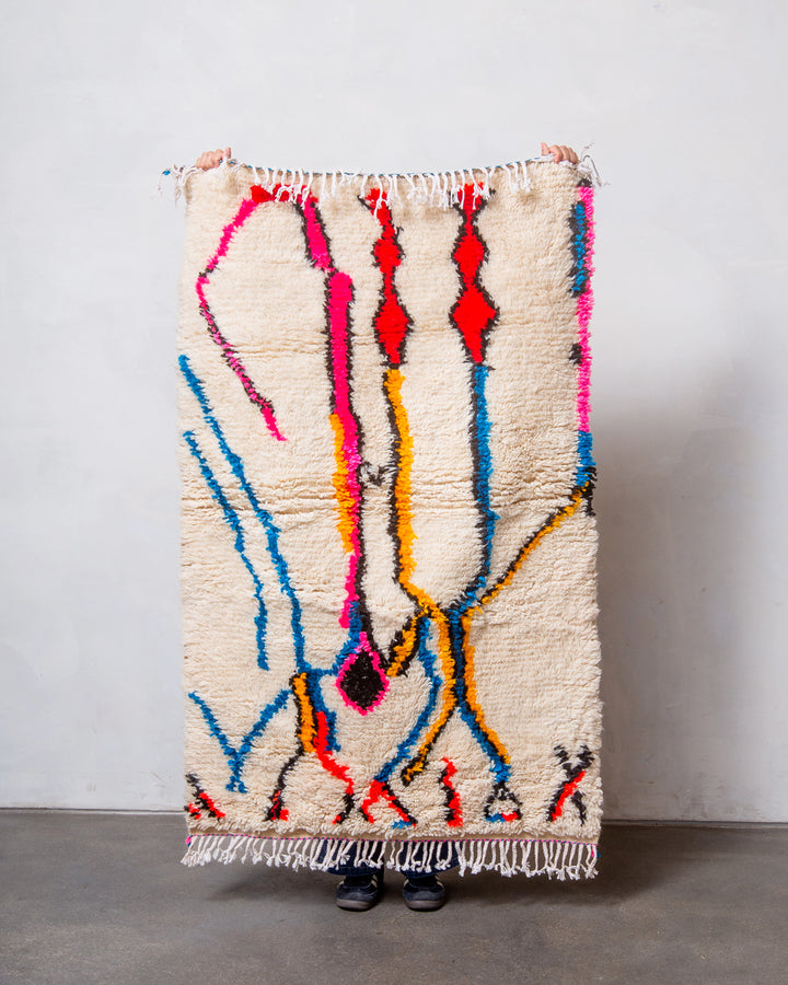 Modern designer handcrafted Berber rug from Morocco. Azilal rug with beautiful colours and patterns. Made of sheep’s wool and colourful cotton.