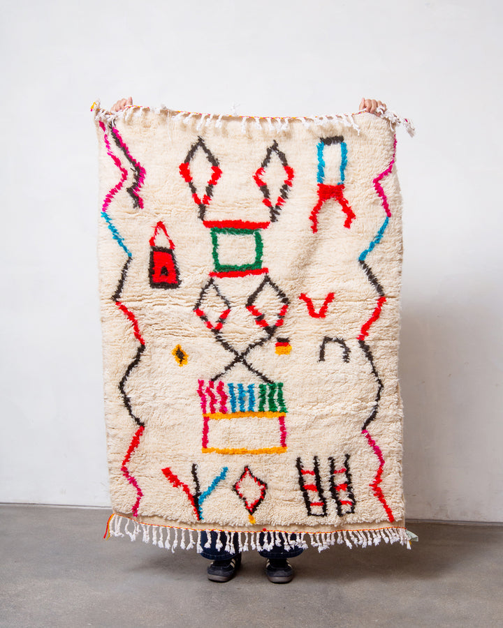 Modern designer handcrafted Berber rug from Morocco. Azilal rug with beautiful colours and patterns. Made of sheep’s wool and colourful cotton.