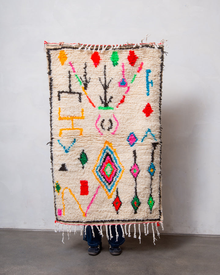 Modern designer handcrafted Berber rug from Morocco. Azilal rug with beautiful colours and patterns. Made of sheep’s wool and colourful cotton.