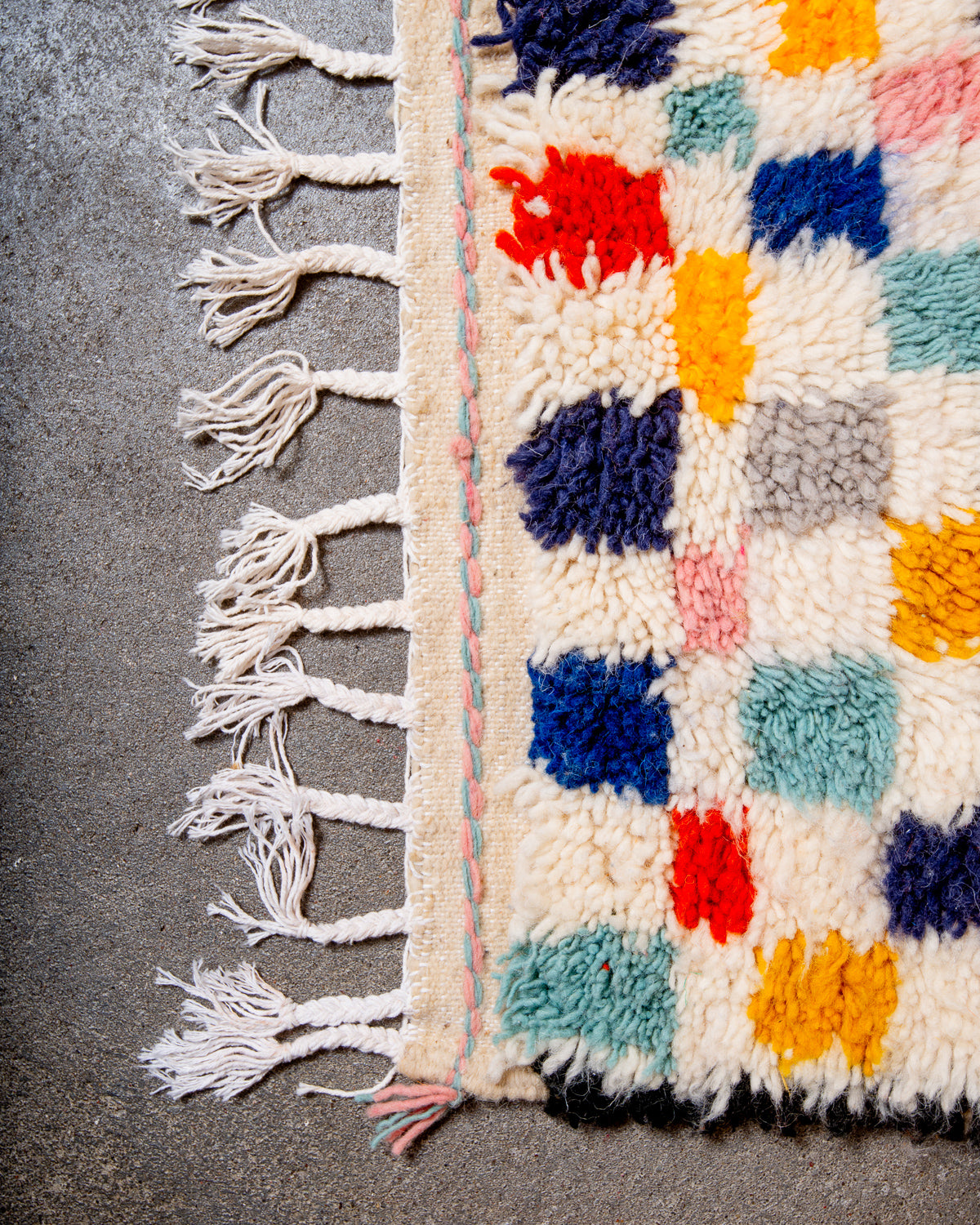 Modern designer handcrafted Berber rug from Morocco. Azilal rug with beautiful colours and patterns. Made of sheep’s wool and colourful cotton.