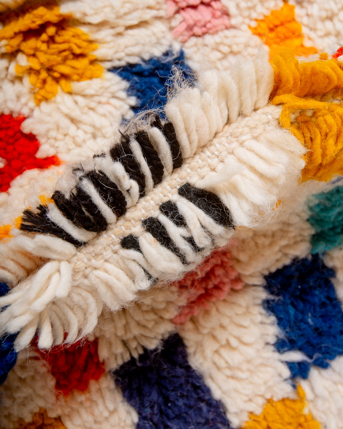 Modern designer handcrafted Berber rug from Morocco. Azilal rug with beautiful colours and patterns. Made of sheep’s wool and colourful cotton.