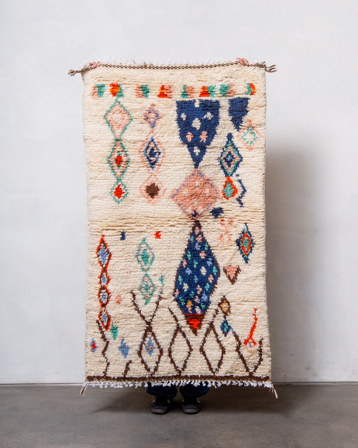 Modern designer handcrafted Berber rug from Morocco. Azilal rug with beautiful colours and patterns. Made of sheep’s wool and colourful cotton.