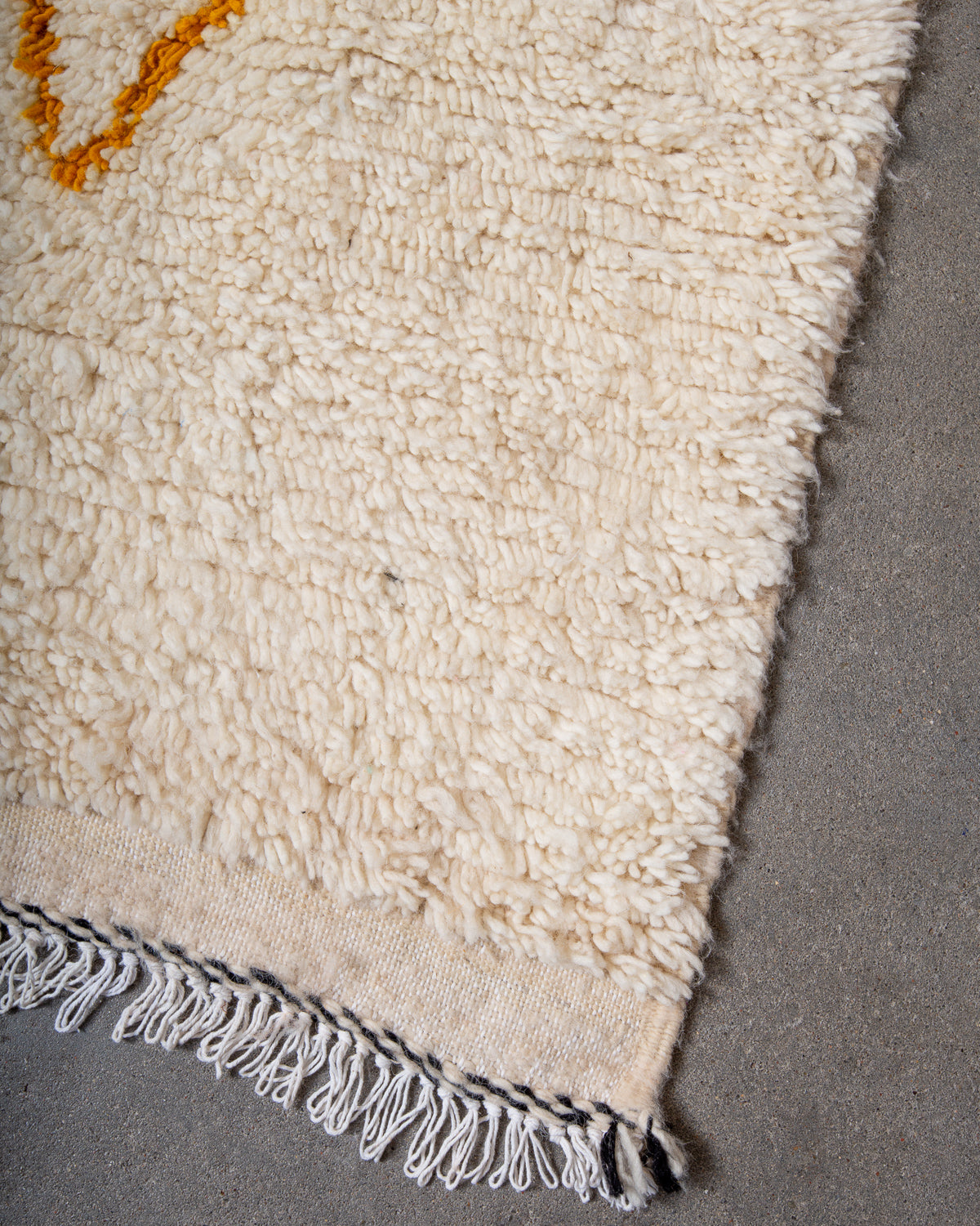 Modern, designer, handcrafted Berber rug from Morocco. Beniourain carpet with beautiful colours and patterns and fluffy wool texture.