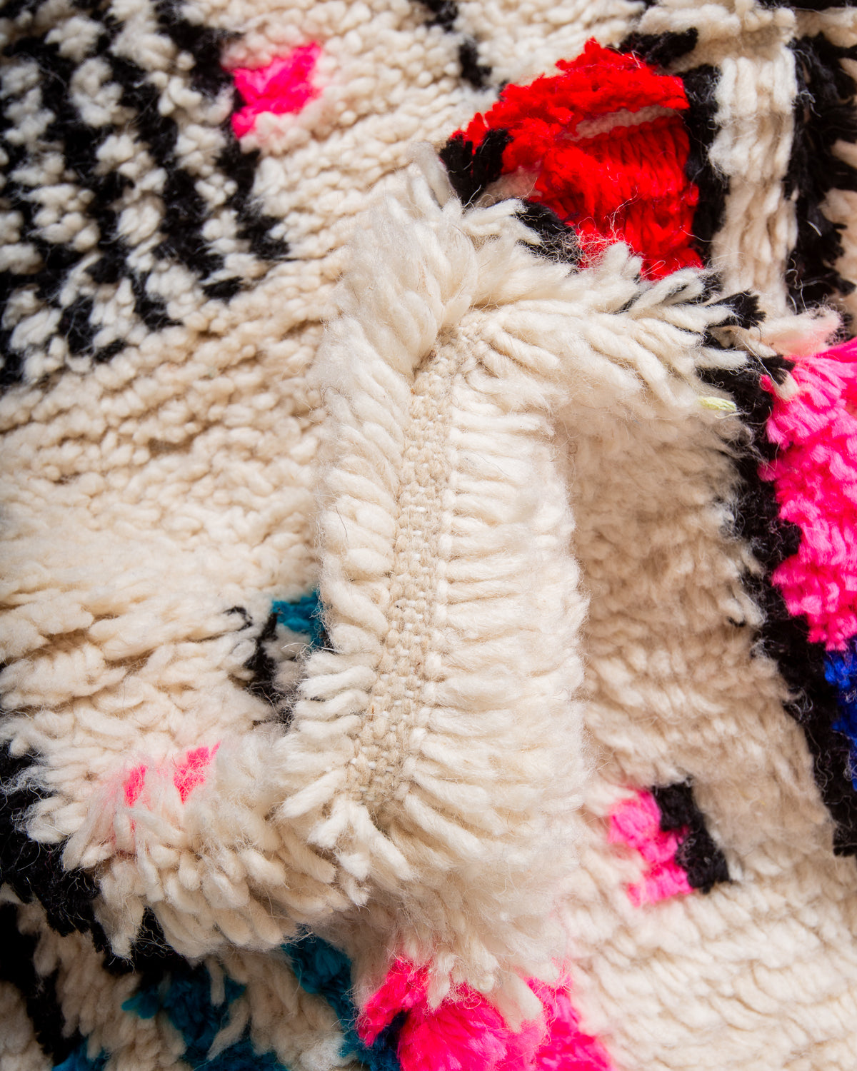 Modern designer handcrafted Berber rug from Morocco. Azilal rug with beautiful colours and patterns. Made of sheep’s wool and colourful cotton.