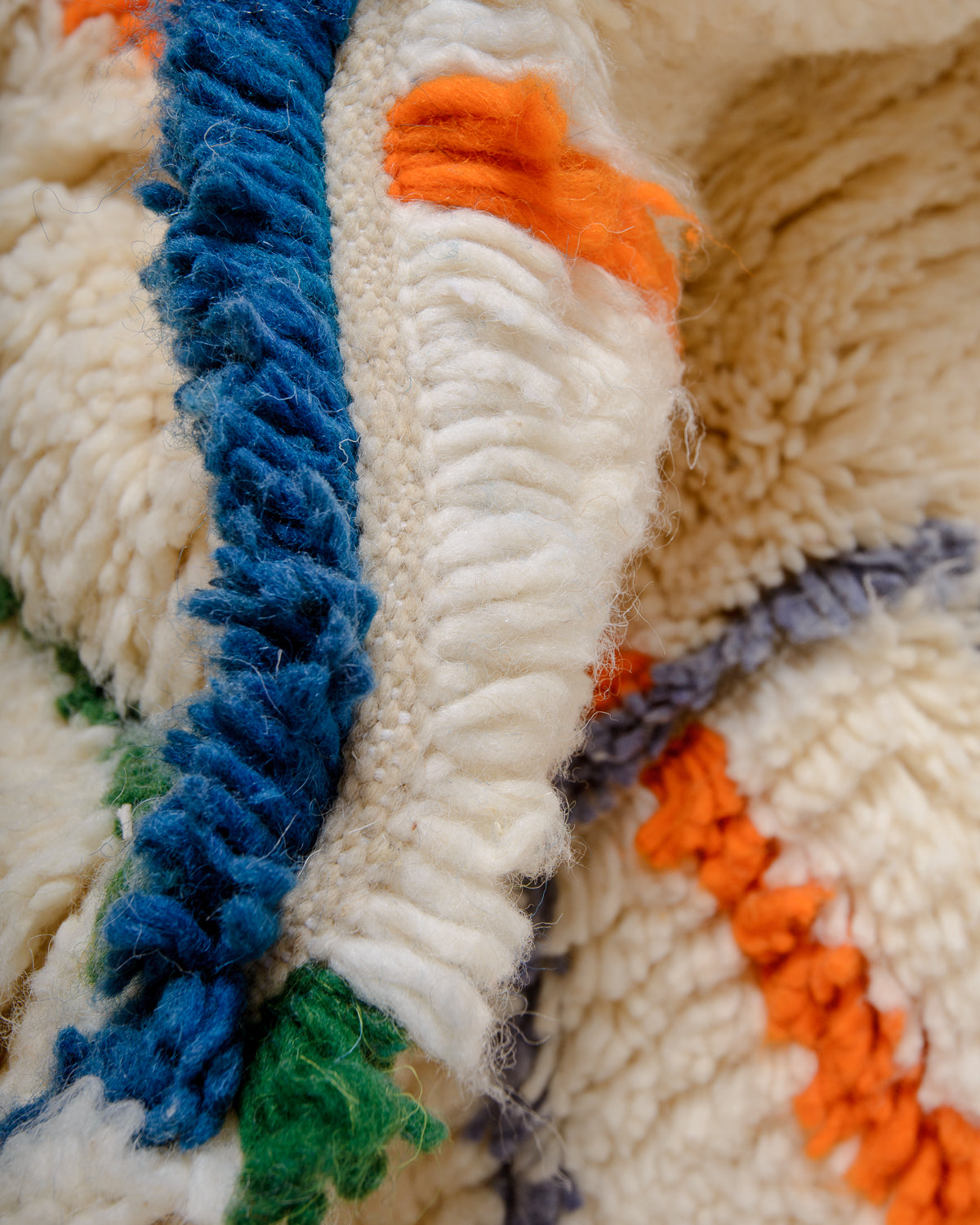 Modern designer handcrafted Berber rug from Morocco. Azilal rug with beautiful colours and patterns. Made of sheep’s wool and cotton.