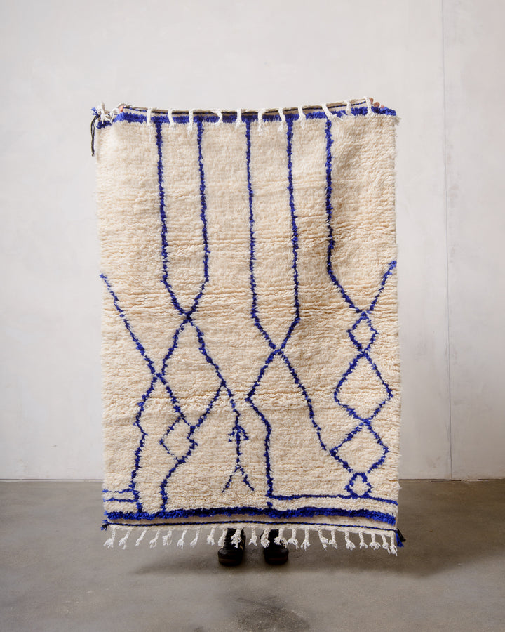 Modern designer handcrafted Berber rug from Morocco. Azilal rug with beautiful colours and patterns. Made of sheep’s wool and cotton.