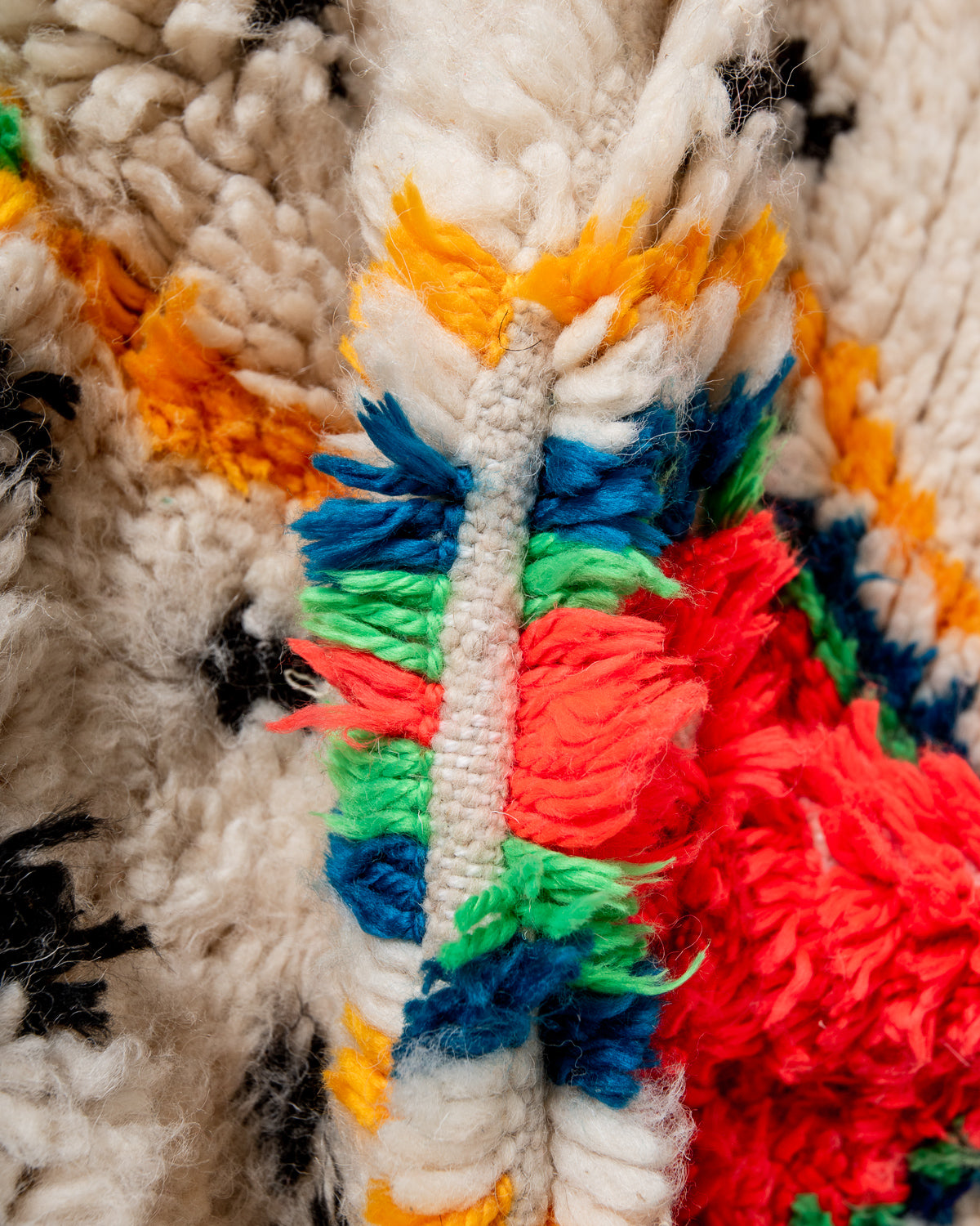 Modern designer handcrafted Berber rug from Morocco. Azilal rug with beautiful colors and patterns. Made of sheep’s wool and colourful cotton.