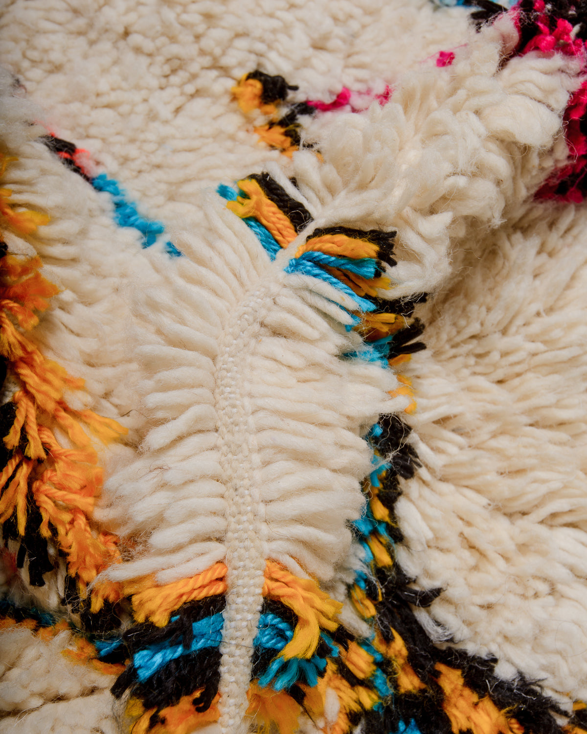 Modern designer handcrafted Berber rug from Morocco. Azilal rug with beautiful colours and patterns. Made of sheep’s wool and cotton.