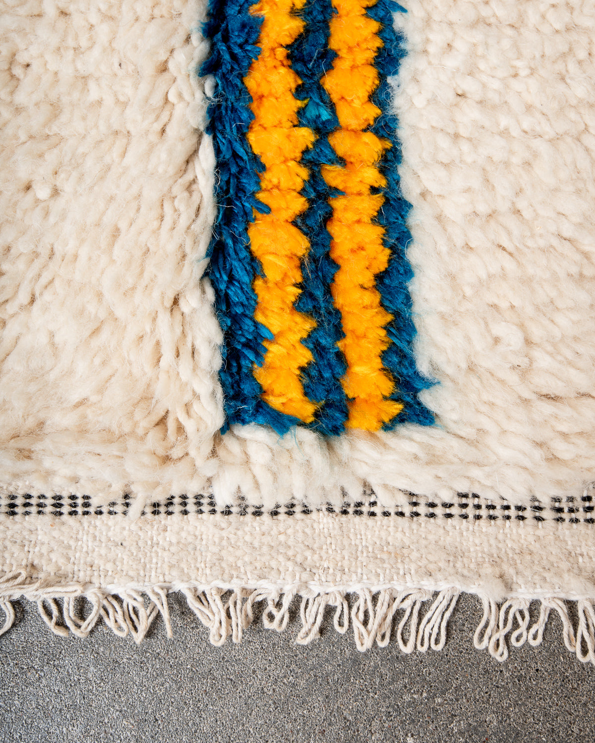 Modern designer handcrafted Berber rug from Morocco. Azilal rug with beautiful colors and patterns. Made of sheep’s wool and colourful cotton.