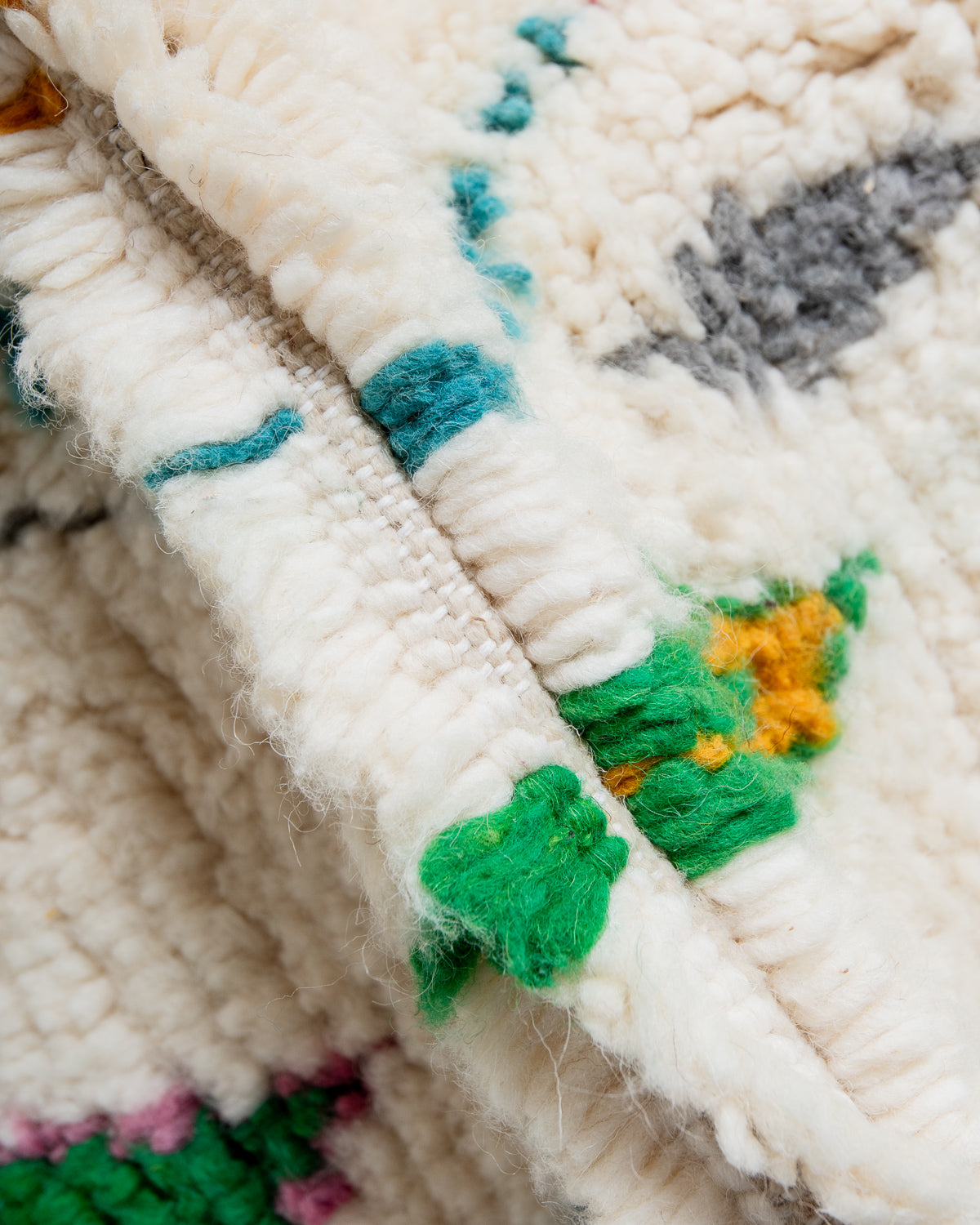 Modern designer handcrafted Berber rug from Morocco. Azilal rug with beautiful colors and patterns. Made of sheep’s wool and colourful cotton.