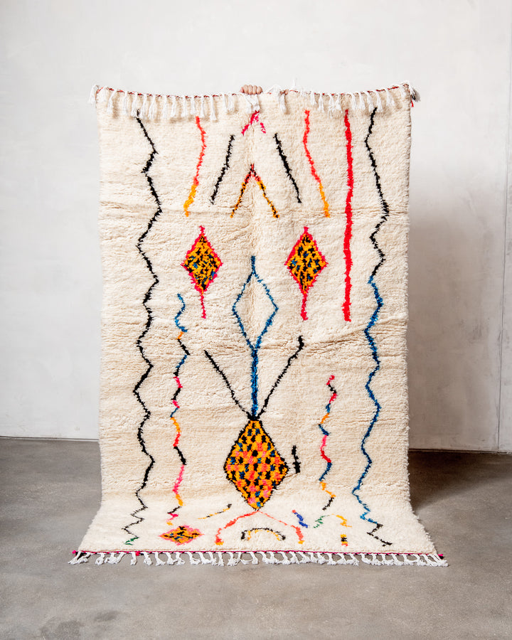 Modern designer handcrafted Berber rug from Morocco. Azilal rug with beautiful colors and patterns. Made of sheep’s wool and colourful cotton.