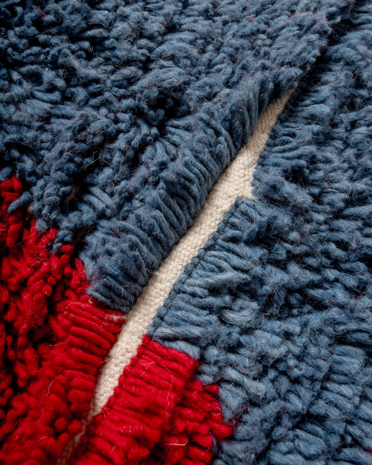 Modern designer handcrafted Berber rug from Morocco. Azilal rug with beautiful colors and patterns. Made of sheep’s wool and colourful cotton.