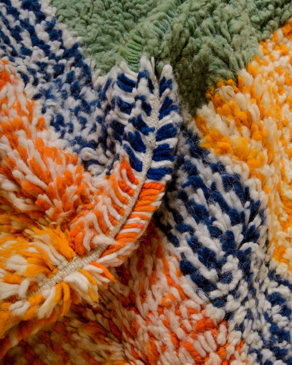 Modern designer handcrafted Berber rug from Morocco. Azilal rug with beautiful colours and patterns. Made of sheep’s wool and cotton.