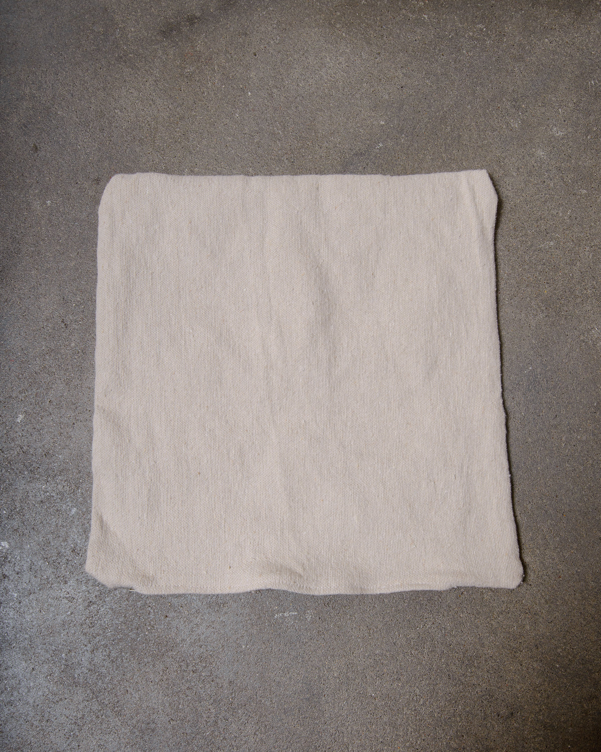 Handcrafted cushion cover from Morocco. Soft Wool cushion with modern, embroidered design.