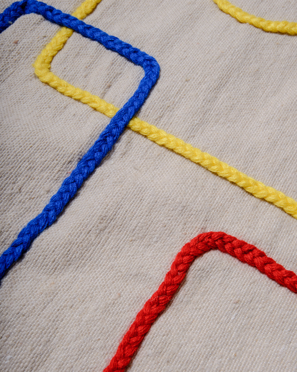 Handcrafted cushion cover from Morocco. Soft Wool cushion with modern, embroidered design.