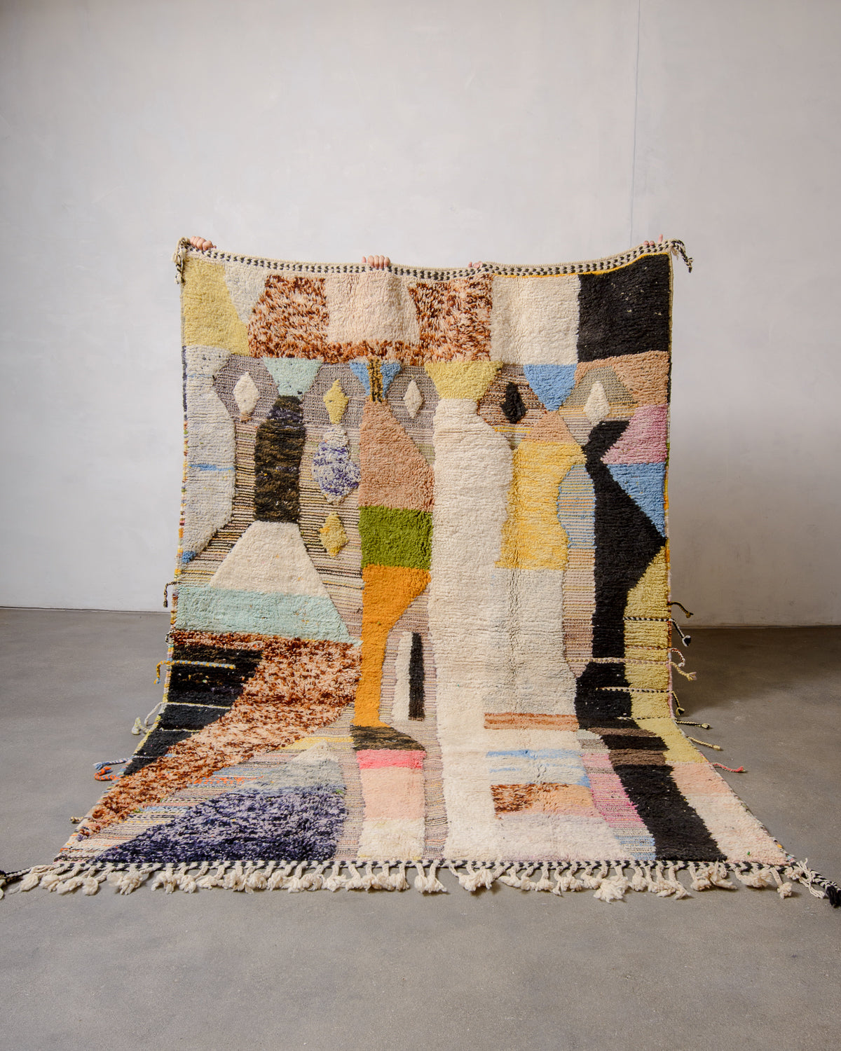 Modern, designer, handcrafted Berber rug from Morocco. Beniourain carpet with beautiful colours and patterns and fluffy wool texture.