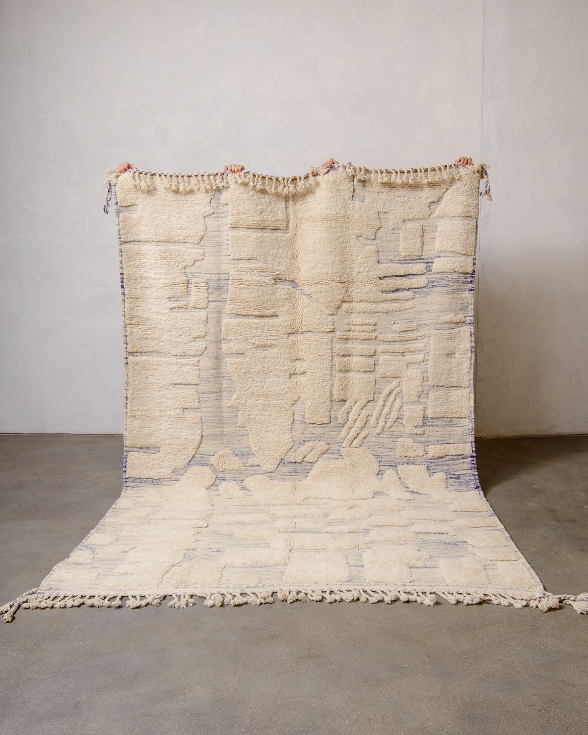 Modern, designer, handcrafted Berber rug from Morocco. Beniourain carpet with beautiful colours and patterns and fluffy wool texture.